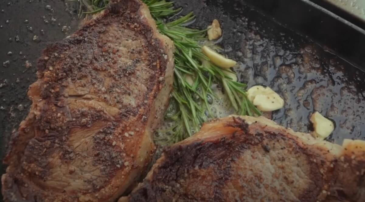 cooking steak on a griddle
