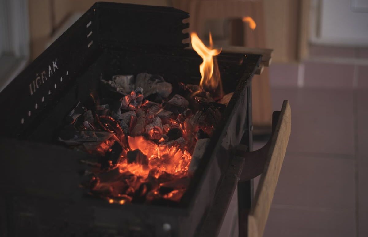 how to put out charcoal grill