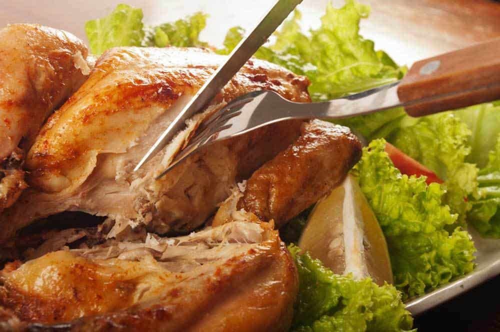 knife-cut-to-tell-if-chicken-is-done